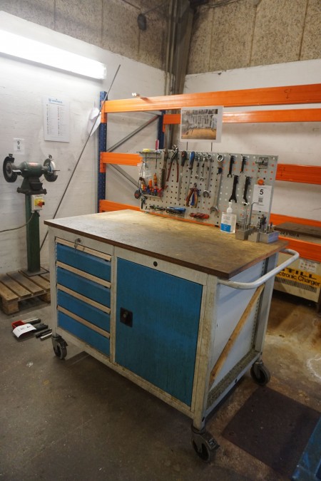 Tool table on wheels with contents