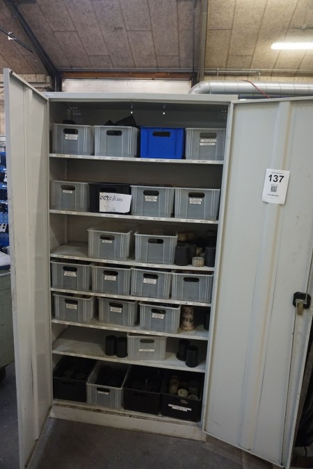 Tool cabinet with contents of various pom materials