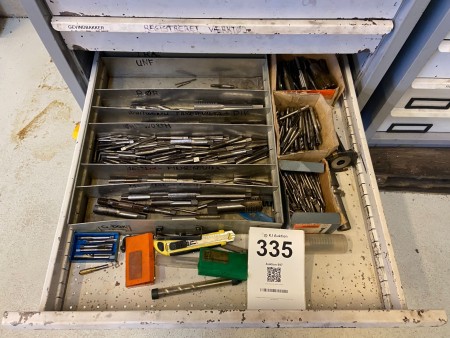 Drawer with various cutting pins