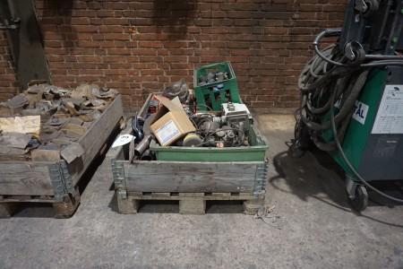 Pallet with various spare parts